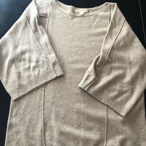 Cashmere being tunic sweater with 3/4th sleeves.